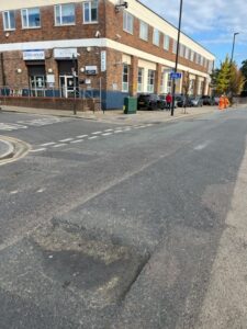 Pothole in Victoria Road, North Acton