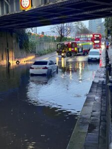 Victoria Road in North Acton floods again under the bridge