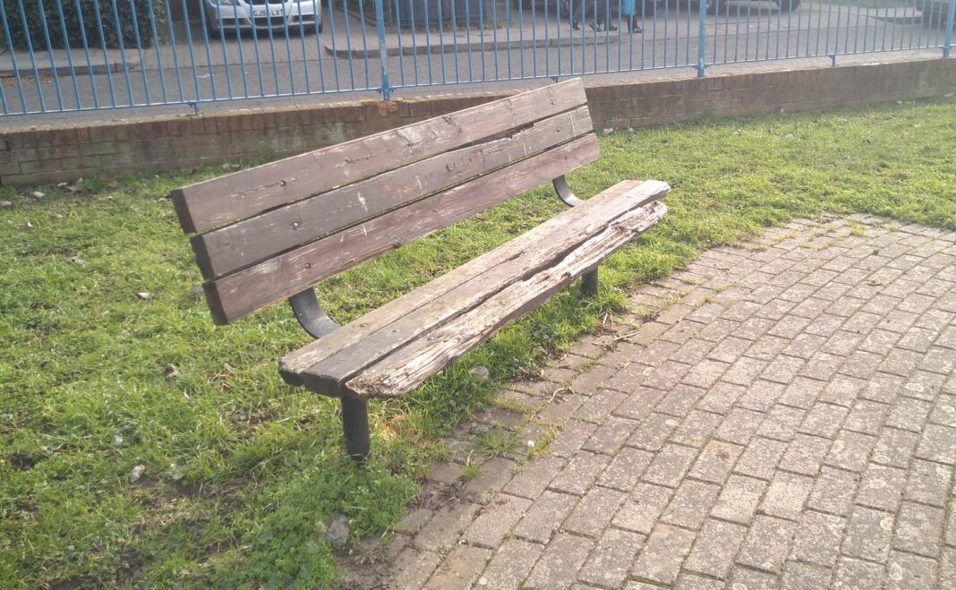 Broken bench in Emerald Square