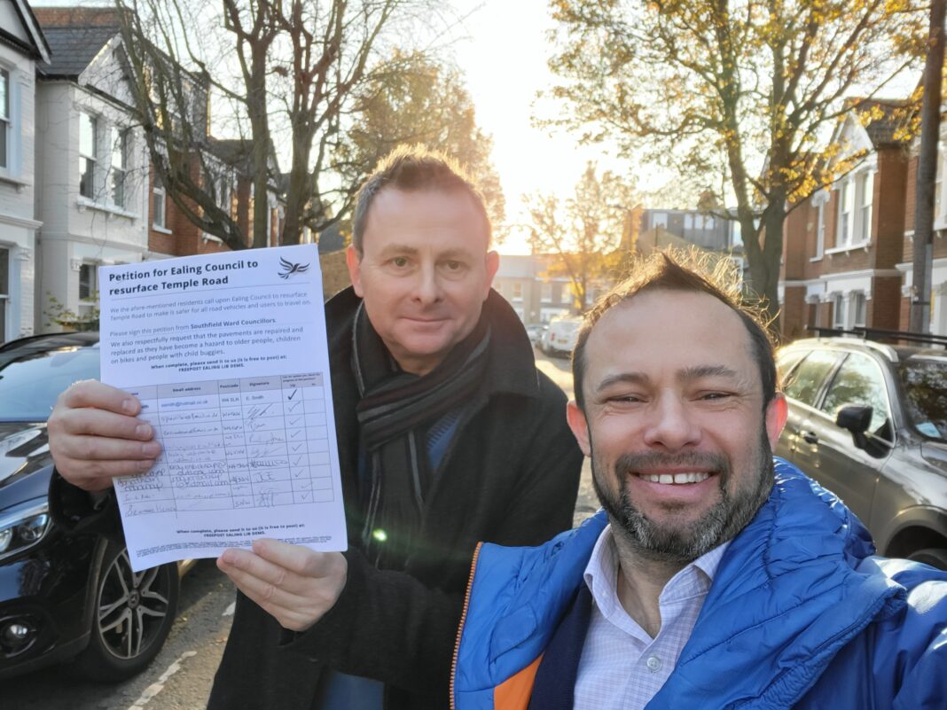 Ealing Lib Dem leader Councillor Gary Malcolm and Southfield ward resident with petition