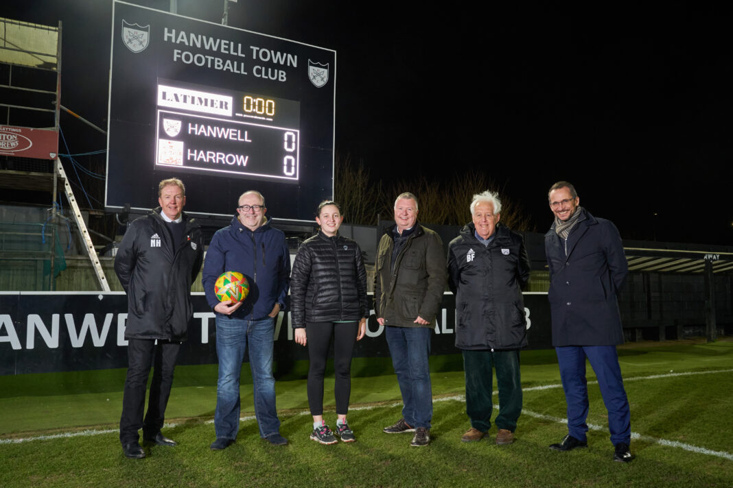 Photo by: Simon Jacobs Latimer sponsor a match between Hanwell FC and Harrow. From left: Nigel Hunt, club CEO, Latimer resident John Curran Elsa Jones, club marketing manager Mark Williams, Director of Technology, Bob Fisher, Club Chairman and Paul Walker, National Sales Director