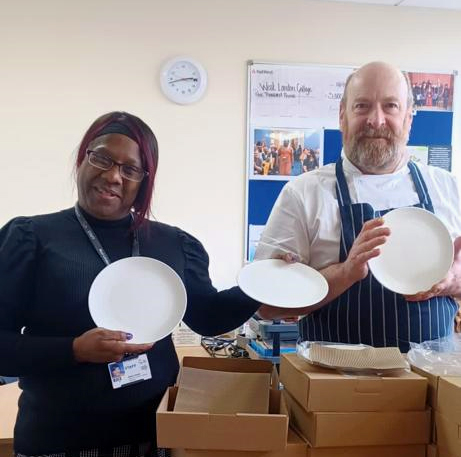 West London College head of service industries Denise Charles and Chef Bob Carruthers nnpacking the China Donated by Wedgwood