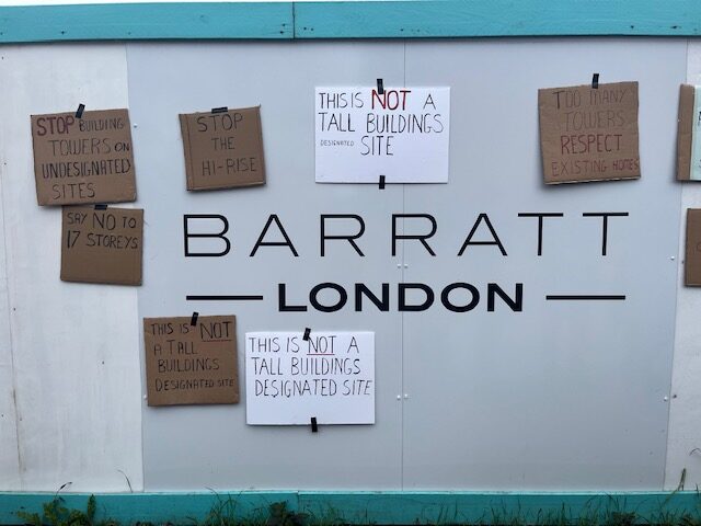 Protest banners against Cloister Close