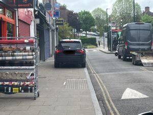 Car parked on pavement