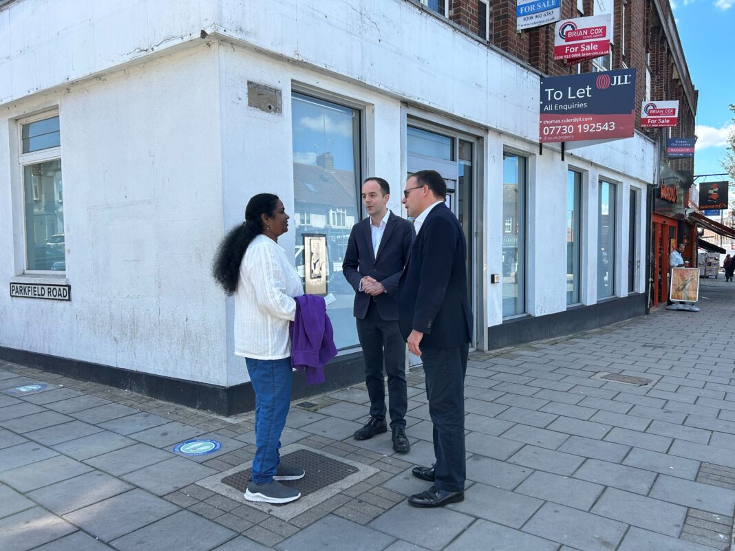 James Murray MP and Gareth Thomas MP outside closed Barclays in South Harrow with local resident