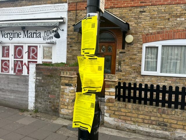 Ealing Council public notices attached to a lamp post. Photo: EALING.NEWS
