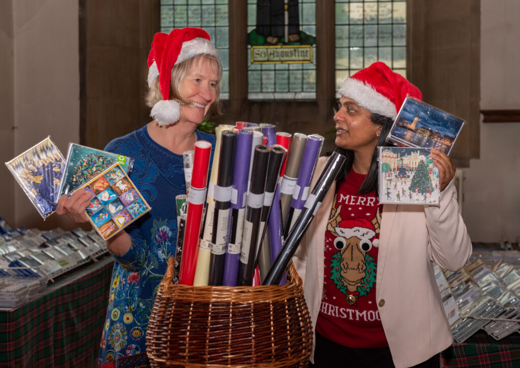 Opening week of the 38th annual Ealing Charity Christmas Card Shop at the Church of Christ the Saviour, New Broadway, Ealing, London W5 2XA are (l-r) Sue Green, founder Ealing Charity Christmas Card Shop and Ealing’s Rupa Huq, MP for Ealing Central and Acton. Photo: Roger Green