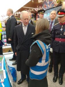 King Charles III meets Cathy Swift from LAGER Can. Photo: LAGER Can