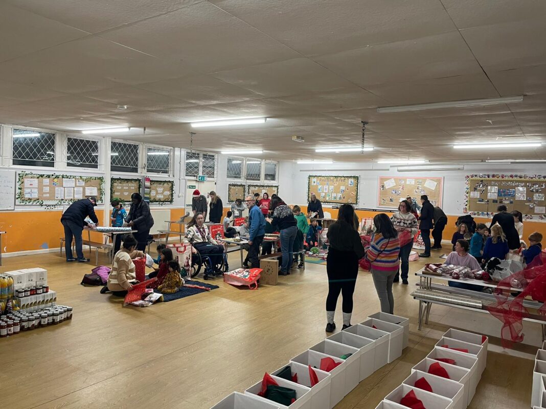 25th Ealing Scouts wrapping presents. Photo: 25th Ealing Scouts