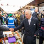 King Charles III visits Ealing Broadway and meets Jaquam from Descendants. Photo: SWNS / British Land