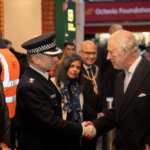 King Charles III visits Ealing Broadway and meets DCI Sean Wilson. Photo: SWNS / British Land.