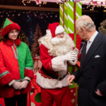 King Charles III visits Ealing Broadway and meets Santa Claus. Photo: SWNS / British Land.