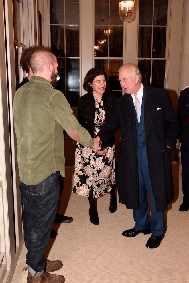 The King shook hands with stone sculpture specialists Tom Nicholls and Josh Locksmith from London Stone Carving. Photo: Tim Bret-Day.