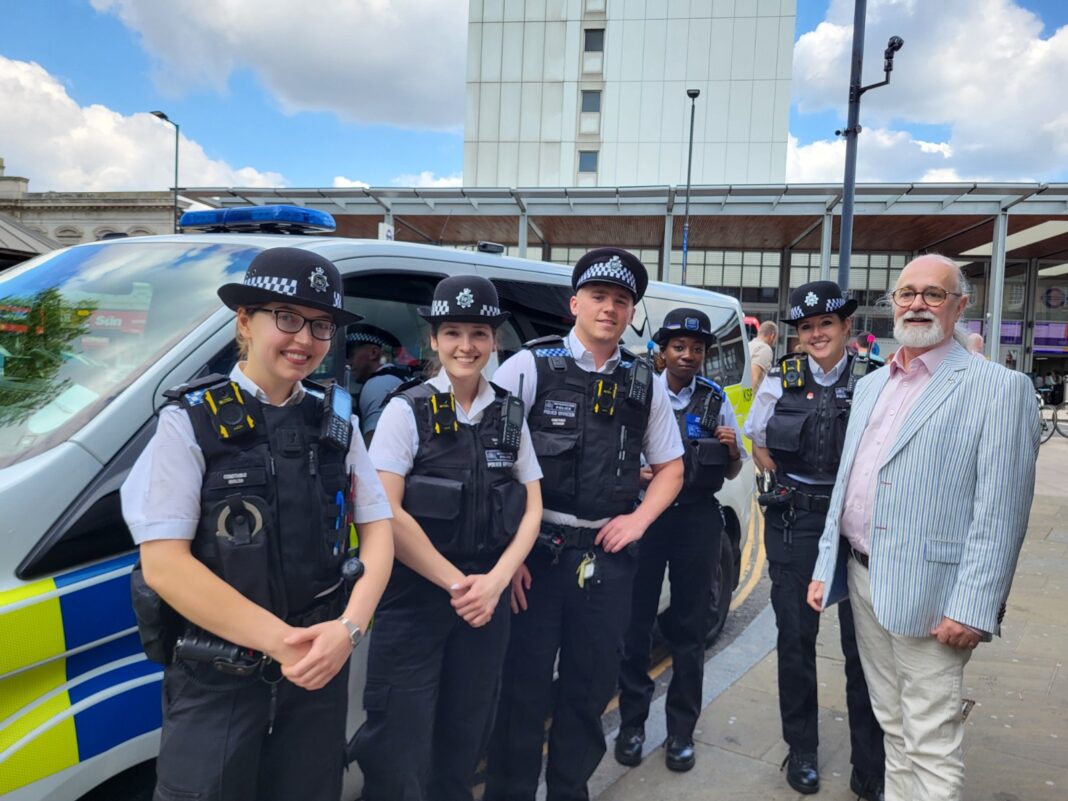 Alastair Mitton (right) with Ealing Safer Neighbourhood police. Photo: Ealing Liberal Democrats