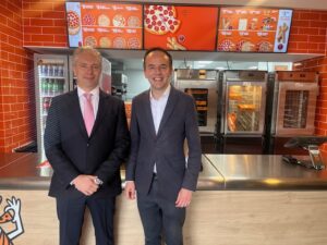 Carlos Vidal, Vice President of International Development Little Caesars and Ealing North MP James Murray.  Photo: EALING.NEWS