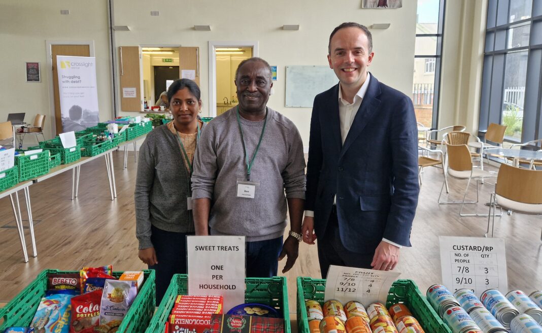 James Murray with Ealing Foodbank volunteers at St Nicholas Church, Perivale. Photo: Ealing Labour