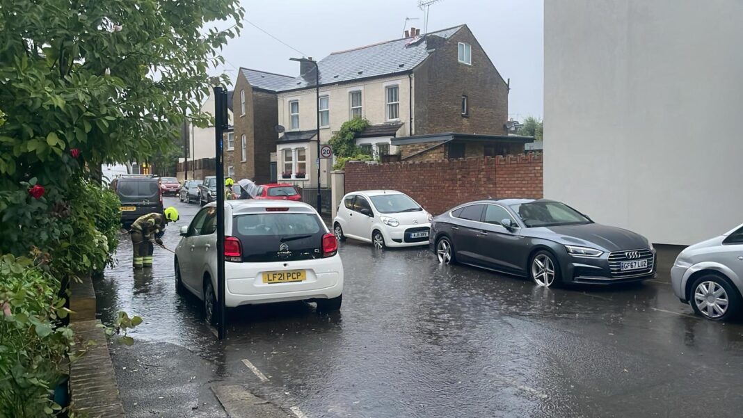 Firefighters clear flood Old Hanwell 15 July 2024. Photo: supplied to EALING.NEWS