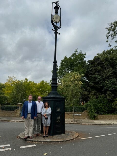 Ealing Broadway Councillors Julian Gallant, Anthony Young and Seema Kumar beside a recently-repaired Victorian street lantern. Photo: Ealing Conservatives