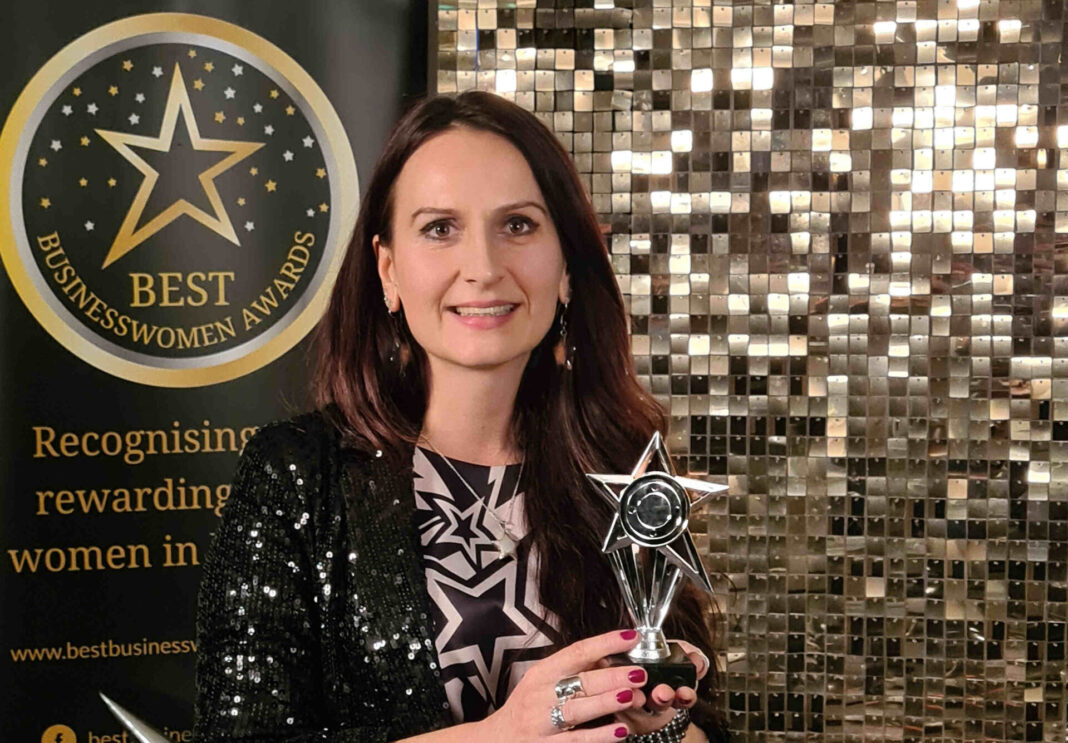 Andreea Tufescu with her Best Businesswomen Award.