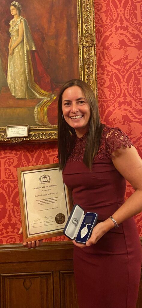 Kimberley Jerray-Silver and her award. Photo: Kimberley Jerray-Silver